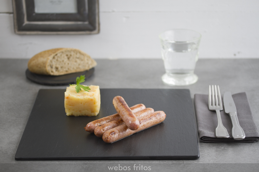 Salchichas de pollo al vino